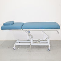 Table de massage électrique avec dossier et repose-jambes réglables, structure métallique, utilisation en salle de sport, salon, mobilier commercial, marque Curtis