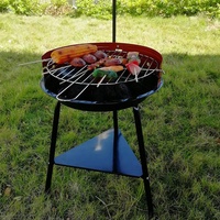 R & D a soutenu le gril portatif de BBQ de charbon de bois rond extérieur pour camper et pique-niquer