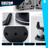 Service de développement de moules personnalisés pour présentoir de casque VR robot en ABS+PC, idéal pour les cadeaux de gamer et les décorations de bureau