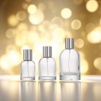 Flacons de parfum de luxe vides personnalisés 30ml 50ml 100ml en verre transparent cylindrique avec pompe pulvérisatrice et couvercle, diffuseur à bâtonnets sérigraphié