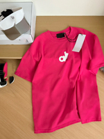 T-shirt ample amincissant noir uni à col ras du cou pour femme, collection été 2026 – Basique en coton à manches courtes pour le début du printemps