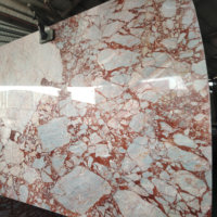Choix de luxe |   Marbre rouge élégant avec des veines, idéal pour les suites de luxe, les salles d'exposition et les intérieurs haut de gamme