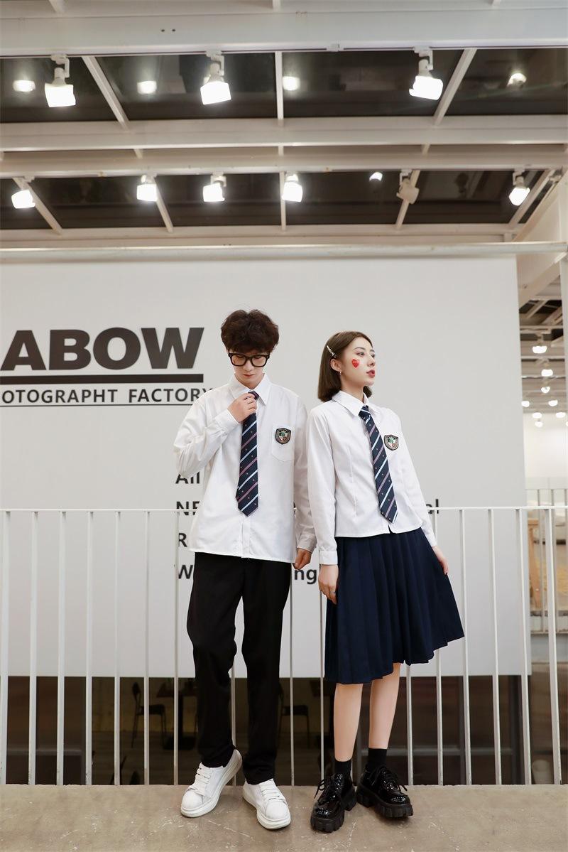 แขนยาวสีขาวของผู้ชาย + กางเกงขายาวสีดำ + เน็คไท + เสื้อแขน