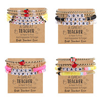 Polymer Clay armband als cadeau voor een leraar met inspirerende kaartje met tekst TEACH INSPIRE letterkraal armband