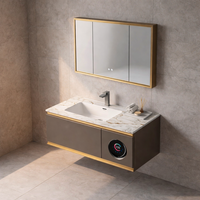 Meuble-lavabo flottant haut de gamme avec éclairage d'ambiance intégré, lavabo, miroir lumineux et design élégant avec finition dorée