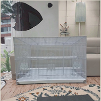 Chine Cage à oiseaux en fil métallique en gros, maison d'oiseau avec support roulant et étagère de rangement