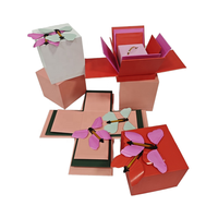 Boîte cadeau papillon volant surprise avec bougie, gâteau, fleurs et couches surprise, boîte cadeau papillon volant