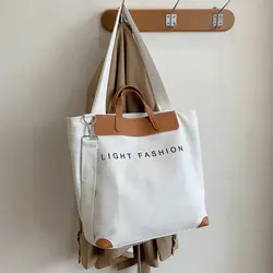 Nouveau logo de conception et un grand sac fourre-tout en toile à bandoulière simple en coton avec différentes méthodes d'impression