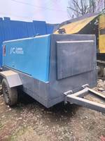 Compresseur d'air rotatif à double vis d'occasion japonais Airman PDS 400 S, 11m³/min, 400cfm, 7 bars, avec moteur Isuzu V3800, 81 kW