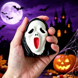 En stock : Jouet anti-stress à presser en forme de tête de citrouille fantôme d'Halloween, rempli de maltose, pour la vente au détail en magasin - Product Image 1