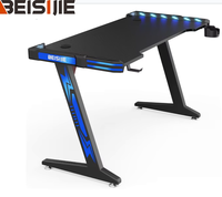 Bureau de jeu Wquantum moderne avec LED RGB, hauteur réglable, structure en métal en forme de Z, surface en mélamine, crochet pour casque, porte-gobelet, utilisation au bureau, rouge