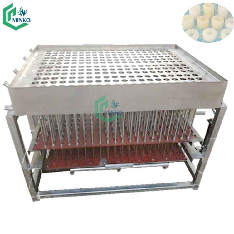 Machine automatique de fabrication de bougies chauffe-plat