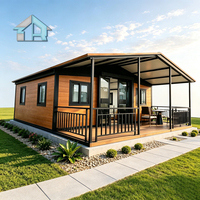 Maison préfabriquée extensible imperméable de 20 pieds, conteneur modulaire extensible, mini-maison amovible pour bureau temporaire ou hébergement