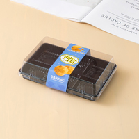 Boîtes d'emballage transparentes en PET à 6 compartiments, idéales pour les produits alimentaires tels que les macarons au chocolat et les desserts.