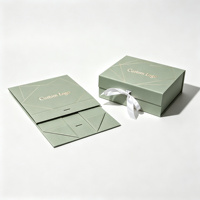 Tragbare Flache Faltbare Starre Geschenkbox mit Blush-Textur, Goldener Geometrischer Prägung, Individuellem Logo und Satinband für Kosmetikverpackungen