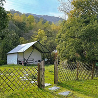 Revêtement de PVC de cadre en acier de tente de toile nomade de luxe résistante personnalisable pour l'isolation de plate-forme en bois de salons de jardin