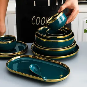 Set di piatti dorati con smeraldo di lusso leggero di alta qualità Set di piatti per zuppa in ceramica per uso domestico