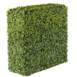 Fleurs artificielles mur vert
