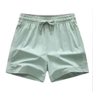 Short de sport personnalisé pour femmes pour l'entraînement, l'échauffement, taille haute, décontracté, coupe ample, short de yoga en polyester, décoration sans couture, poche avec logo - Product Image 1