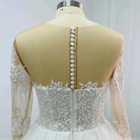 Nouvelle Arrivée Robe de Mariée de Luxe Princesse à Manches Longues, Ornée de Perles, Robe de Bal avec Grande Traîne