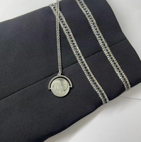 Pendentif à illusion optique tournant « Je t'aime » en acier inoxydable. Collier avec inscription tournante, collier spinner