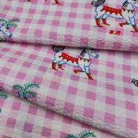 Tela 100% algodón con estampado de ponis, textura suave y arrugada, ideal para vestidos, faldas y blusas infantiles, 50 pulgadas.