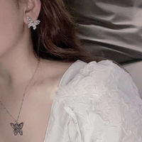 Ensemble de bijoux de luxe en argent pistolet plaqué noir plein diamant Zircon papillon boucles d'oreilles collier bague mariage Festival cadeau femmes