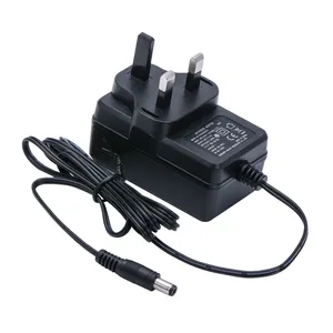 נמכר היטב בבריטניה 12V 2A 24W AC DC מתאם מתח מטען קיר ספק כוח