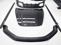 Kit carrosserie complet en fibre de carbone sèche de style OC de haute qualité (lame avant, jupes latérales, diffuseur arrière, capot) pour Porsche Panamera 976 2024+