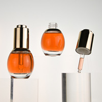 Échantillon gratuit de l'usine ampoule personnalisée forme ovale vide clair cosmétique 20ml compte-gouttes d'huile essentielle fond de teint bouteille en verre
