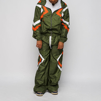 Ensemble de survêtement streetwear personnalisé en polyester et nylon, coupe ample et oversize, épais, pour la course et le jogging, avec coupe-vent à capuche zippé