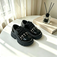 Mocassins unisexes noirs à boucle métallique brillante pour garçons, chaussures de campus à semelle épaisse pour étudiants, idéales pour les fêtes et le quotidien