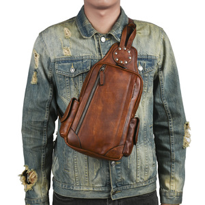กระเป๋าคาดหน้าอกผู้ชายสไตล์เรโทรหนังแท้ความจุขนาดใหญ่สำหรับใช้ในชีวิตประจำวันสีน้ำตาลสีทึบ - Product Image 1