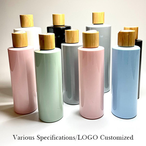 Botellas de plástico redondas para champú y acondicionador, tapa de disco de bambú de madera, personalizadas, de WeWood, de Vietnam - Product Image 2