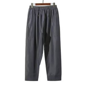 Muslim men's casual pants are comfortable, loose-fitting, solid-colored, with an <b>elastic</b> waistband and a flat front - Product Image 1