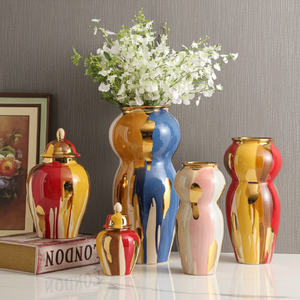 Juego de jarrones y recipientes de cerámica de colores con glaseado dorado. Glamoroso. Disponible a precios de mayoreo - Product Image 1