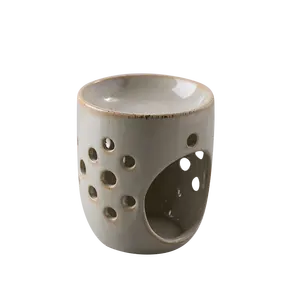 Wholesale hollow out round shape personalized ceramic oil Incense burner