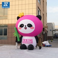 Ours géant gonflable en peluche rose foncé personnalisé avec bambou pour la décoration d'activités romantiques en plein air
