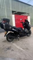 Scooter T10 Maxi d'occasion en excellent état. Moteur 250cc, valises complètes, affichage numérique, entièrement fonctionnel, noir, CVT