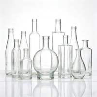 Bouteilles à spiritueux en verre transparentes de formes variées, personnalisables avec logo, pour gin, vodka, whisky, vin, vente en gros