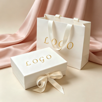 Boîtes cadeaux pliables de luxe personnalisées avec fermeture magnétique, ruban, marquage à chaud et gaufrage, matériaux recyclés, personnalisables