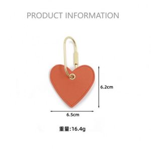 HR Wholesale PU Leather Embossed Heart Leather Keychain Modern <b>Key</b> <b>Rings</b> Personalised Saffiano Leather Heart Keyring for Gifts - Product Image 3