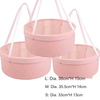 Boîte d'emballage cadeau décorative pliable, durable, portable, réutilisable, de forme ronde avec couvercle et poignée en ruban, disponible en trois tailles