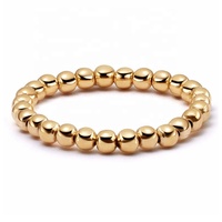 Gemnel de haute qualité en gros bijoux en argent 18k or empilant élastique 2mm anneaux de perles