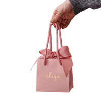 Sacs cadeaux de luxe en papier blanc écologiques personnalisés avec votre propre logo