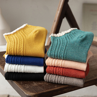 Chaussettes mi-mollet élégantes pour femmes, unies et mignonnes, absorbant la transpiration, idéales pour chaussures en cuir, printemps, automne et été, avec logo discret