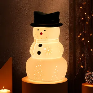 新製品カスタムデザイン白い磁器雪だるまテーブルライトランプファミリークリスマスデコレーションランプ