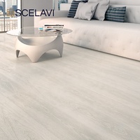 Parquet intérieur imperméable en PVC rigide SPC, texture bois, pose flottante à clipser, motif chevrons, usage commercial, écologique, antibactérien