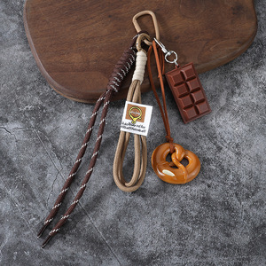 Nouveau porte-clés pendentif pain mignon Miu, eau alcaline, pour étudiants et couples, décoration de sac à dos en PVC, style automne-hiver - Product Image 6