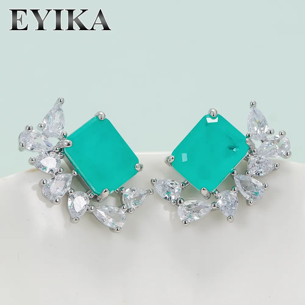 EYIKA लक्जरी अर्द्ध Joias टूमलाइन फ्यूजन के लिए आयत आकार स्टड कान की बाली नीले CZ पत्थर कान की बाली शादी की कान की बाली